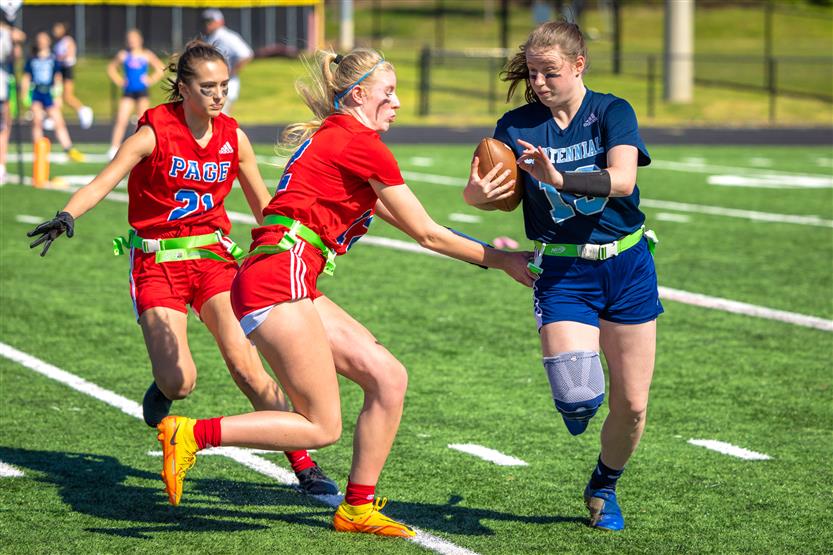 Students play flag football